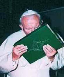 Pope John Paul proving that the pope is in-fact not infallible by kissing the Koran, the “holy” book of Muslims that blasphemes the name of our Lord Jesus Christ.